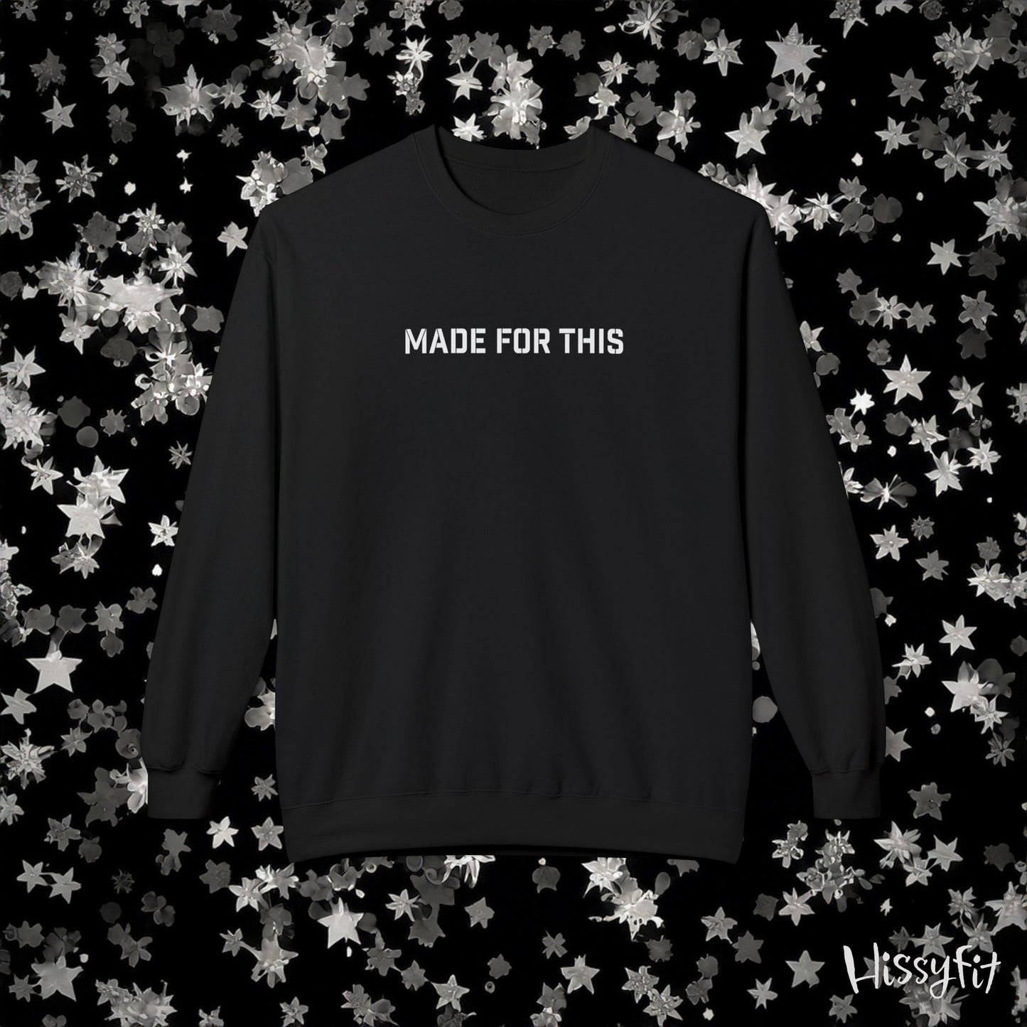 Black sweatshirt with 'MADE FOR THIS' text on a black background with star patterns