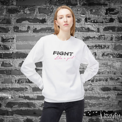 Person wearing a white sweatshirt with 'Fight Like a Girl' text against a textured wall.