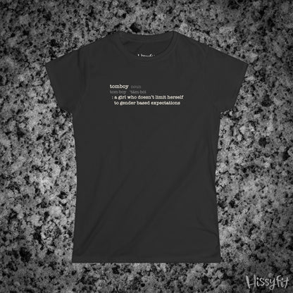Black t-shirt with text 'Tomboy:definition' on a gray granite surface, featuring the brand 'Hissyfit'.