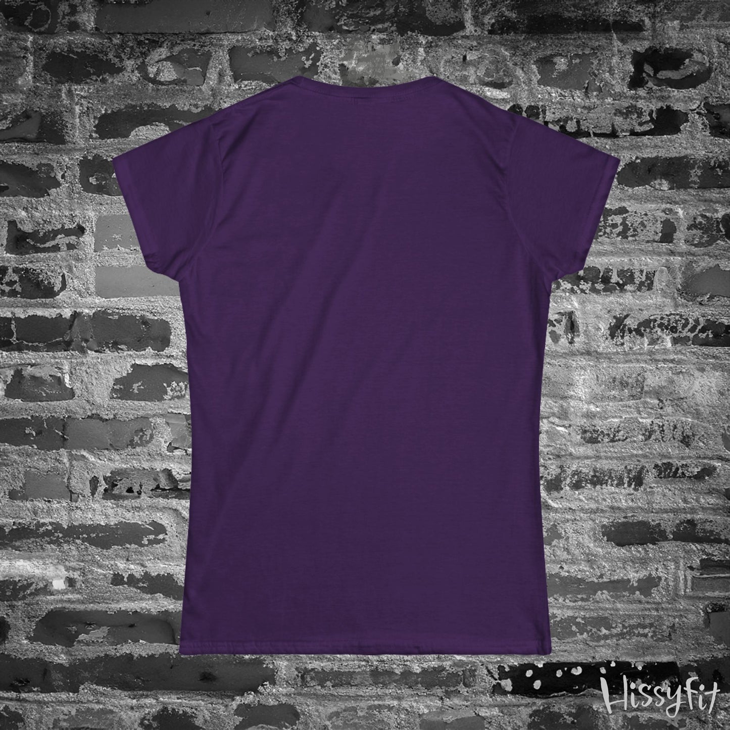 Purple t-shirt on a brick wall background