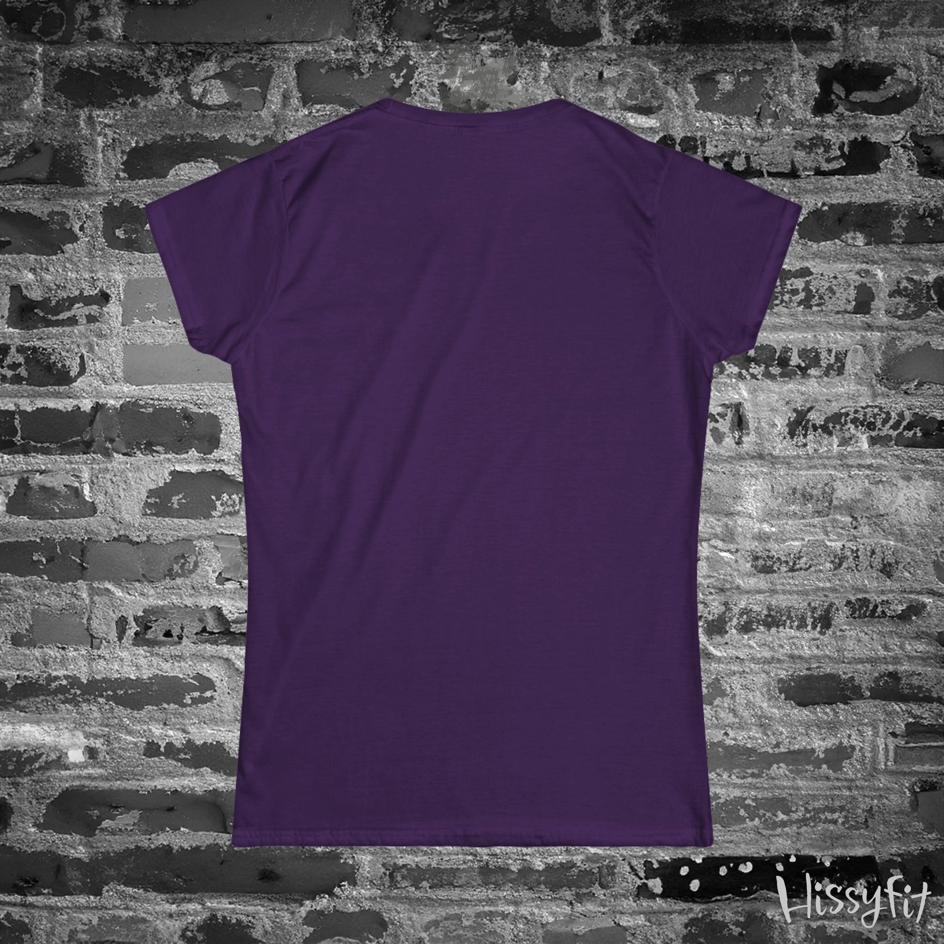 Purple t-shirt on a brick wall background