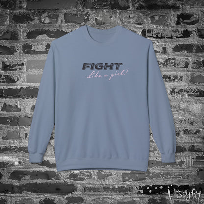 Blue sweatshirt with 'Fight Like a Girl' text on a brick wall background