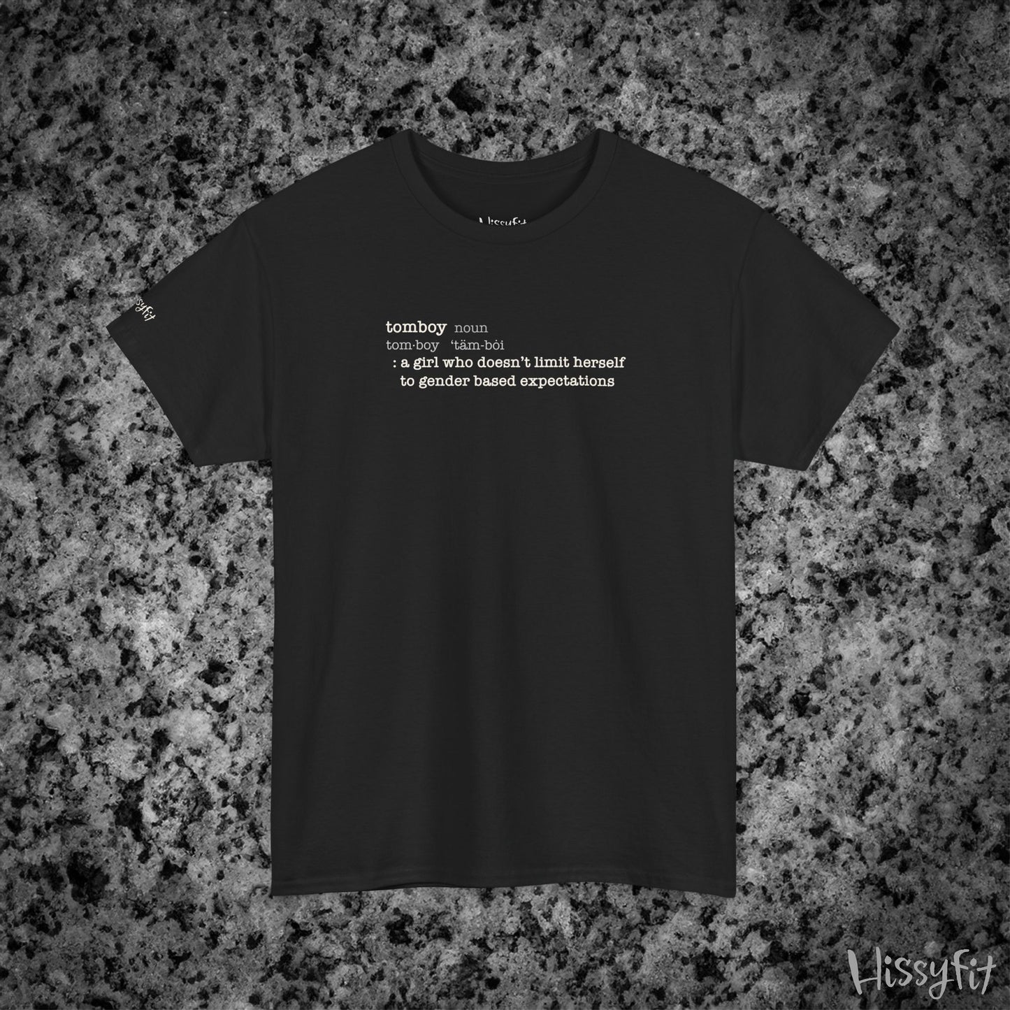 Black t-shirt with text 'Tomboy:definition' on a gray and black speckled background, featuring the brand 'Hissyfit'.
