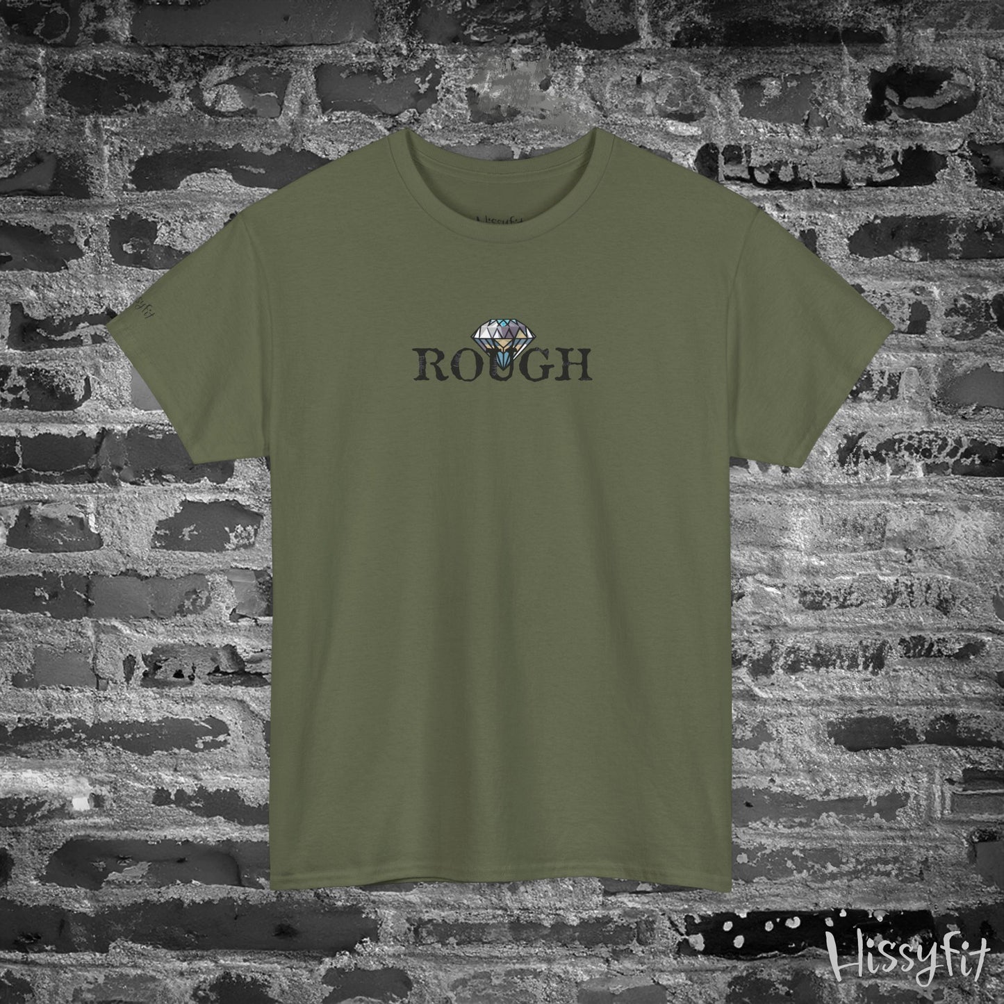 Green t-shirt with 'ROUGH' text and diamond graphic on a stone wall background