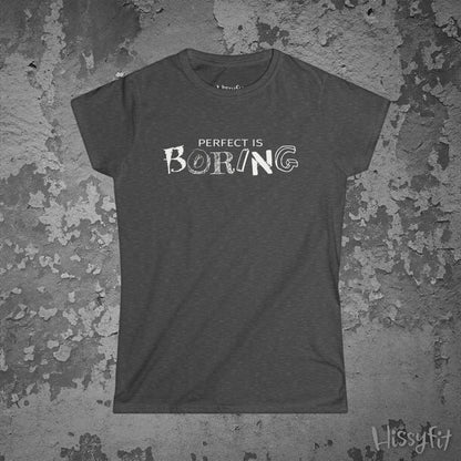 Gray t-shirt with 'Perfect is Boring' text on a textured gray background