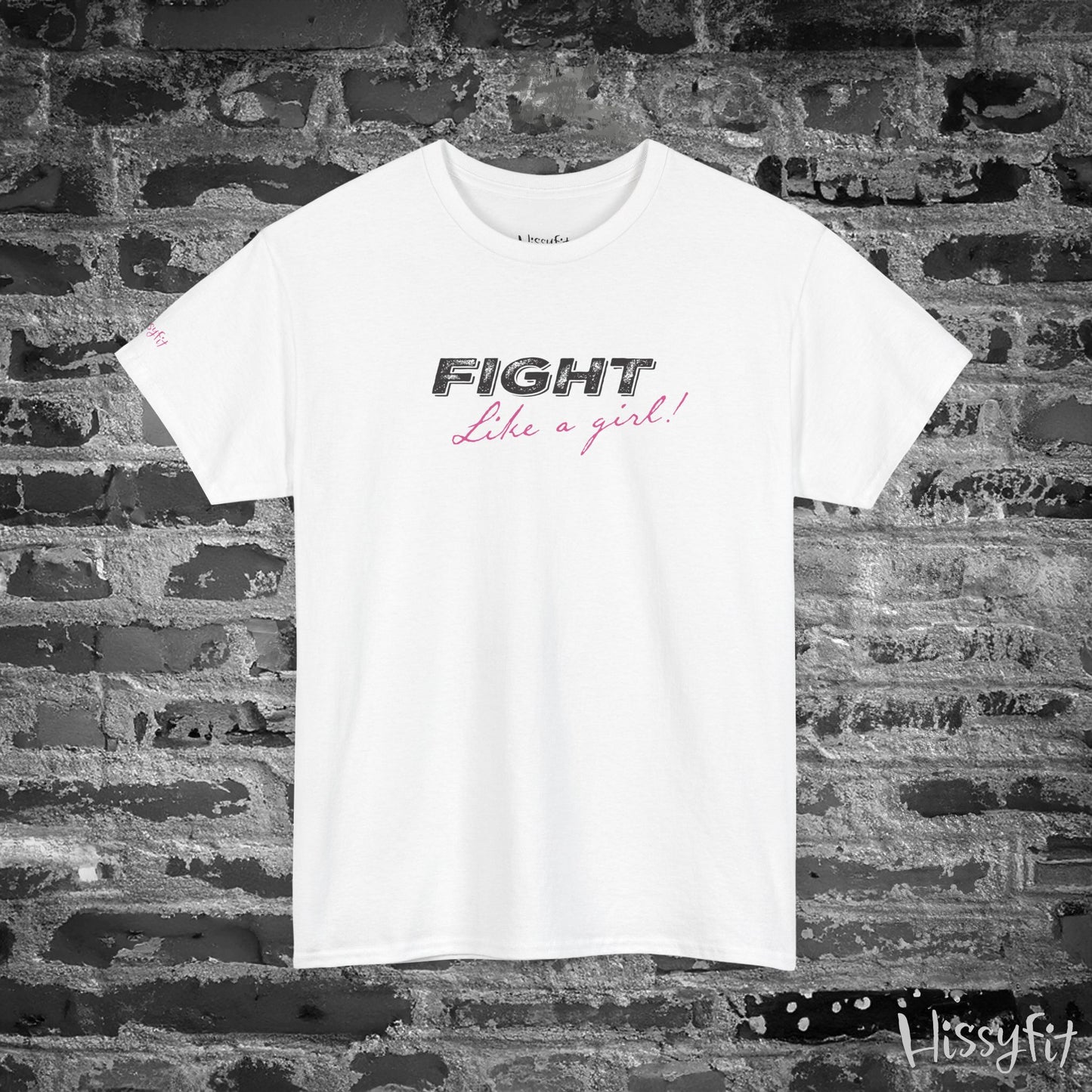 White t-shirt with 'Fight Like a Girl' text on a brick wall background