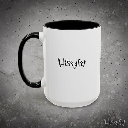 White mug with black interior and handle on a gray background, featuring the word 'Hissyfit'.