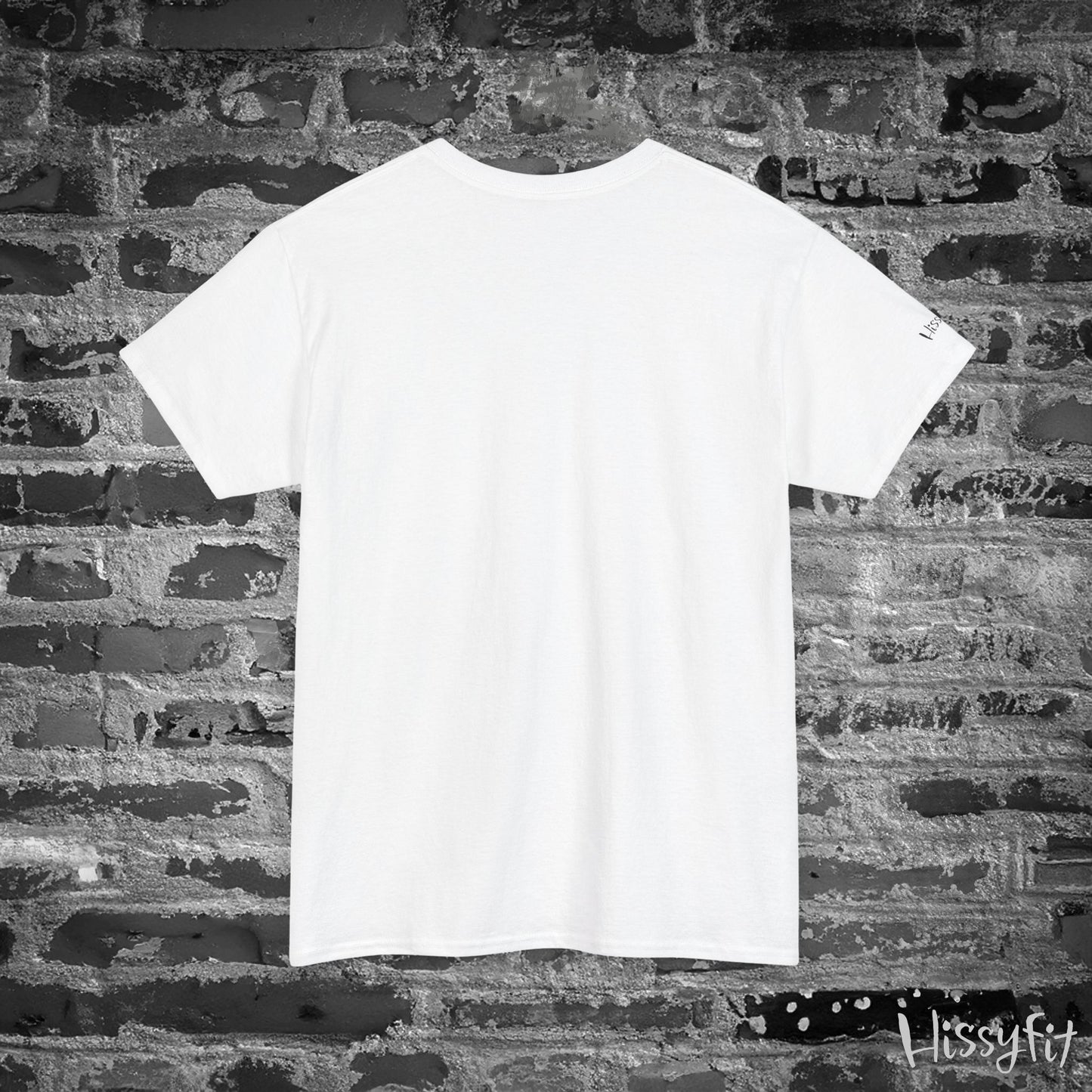 White t-shirt on a brick wall with 'Hissyfit' branding.