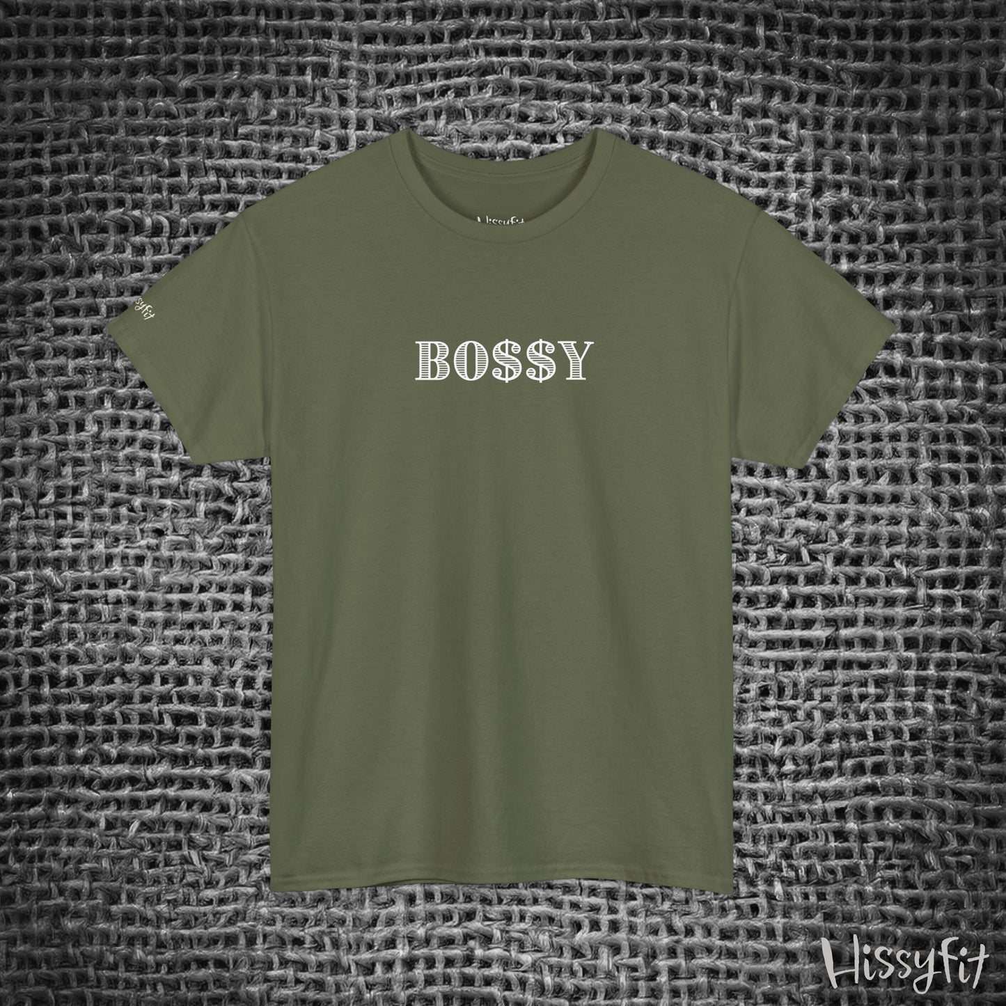 Green t-shirt with 'BOSSY' text on a textured gray background