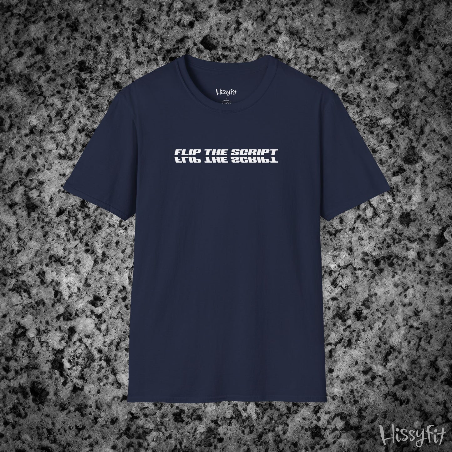 Navy blue t-shirt with white text 'Flip the script' on a gray granite surface