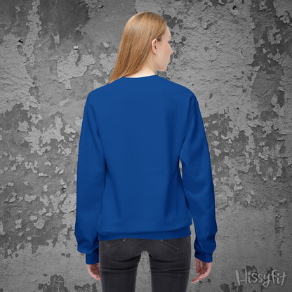 Person wearing a blue sweatshirt against a textured gray wall with 'Hissyfit' branding.