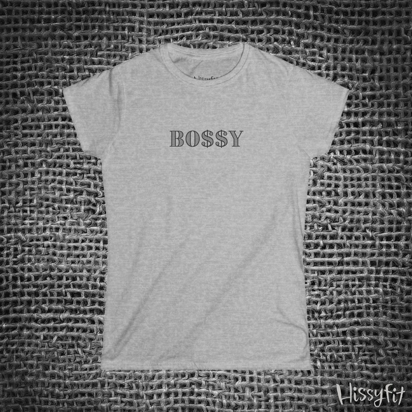 Gray t-shirt with 'BOSSY' text on a textured gray background