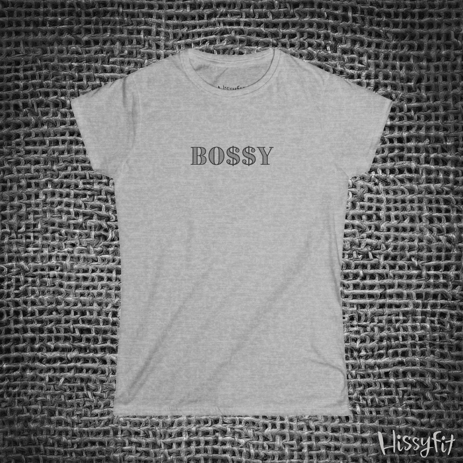 Gray t-shirt with 'BOSSY' text on a textured gray background