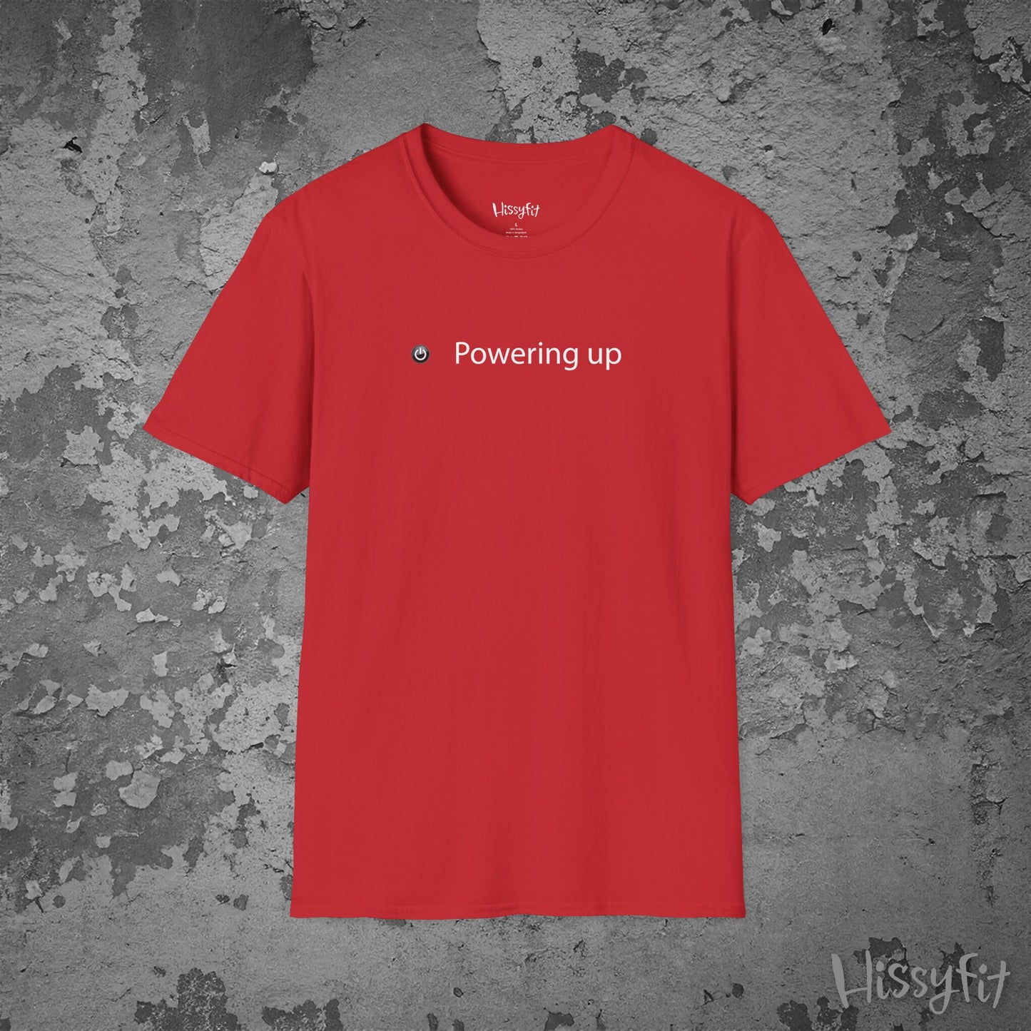 Red t-shirt with 'Powering up' text on a textured gray background