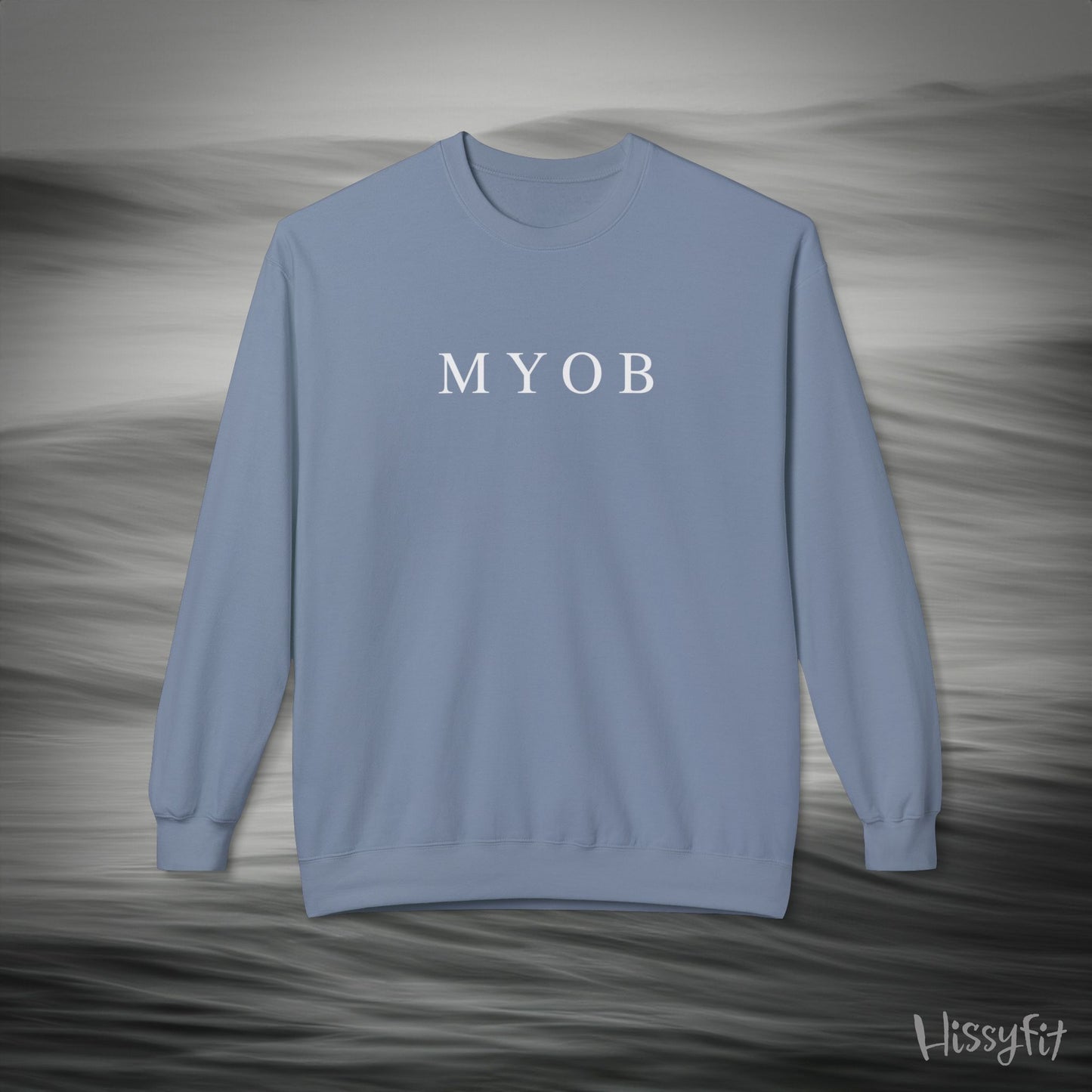 Light blue sweatshirt with 'MYOB' text on a gray background
