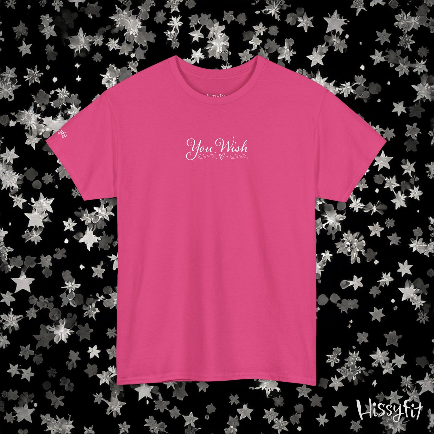 Pink t-shirt with text on a black background with star patterns