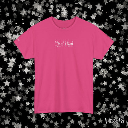Pink t-shirt with text on a black background with star patterns