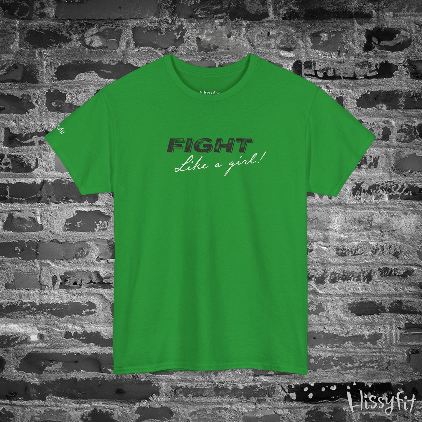 Green t-shirt with 'Fight Like a Girl' text on a brick wall background