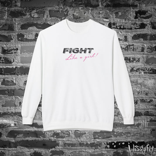 White sweatshirt with 'Fight Like a Girl' text on a brick wall background