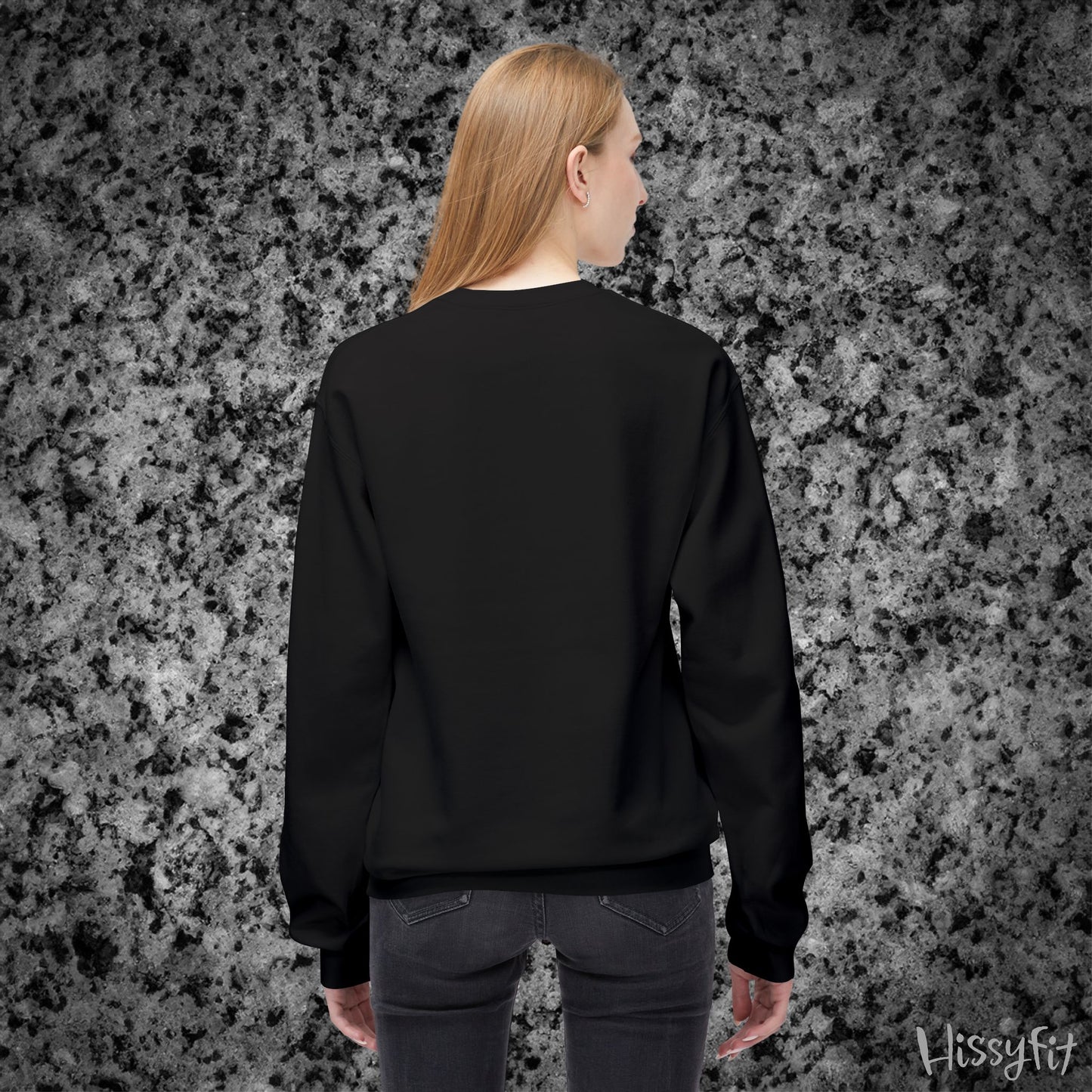 Person wearing a black sweatshirt against a textured gray background with 'Hissyfit' branding.
