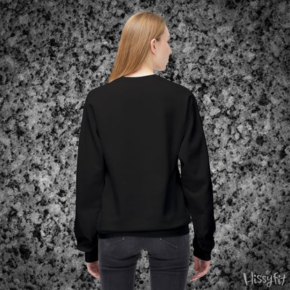 Person wearing a black sweatshirt against a textured gray background with 'Hissyfit' branding.
