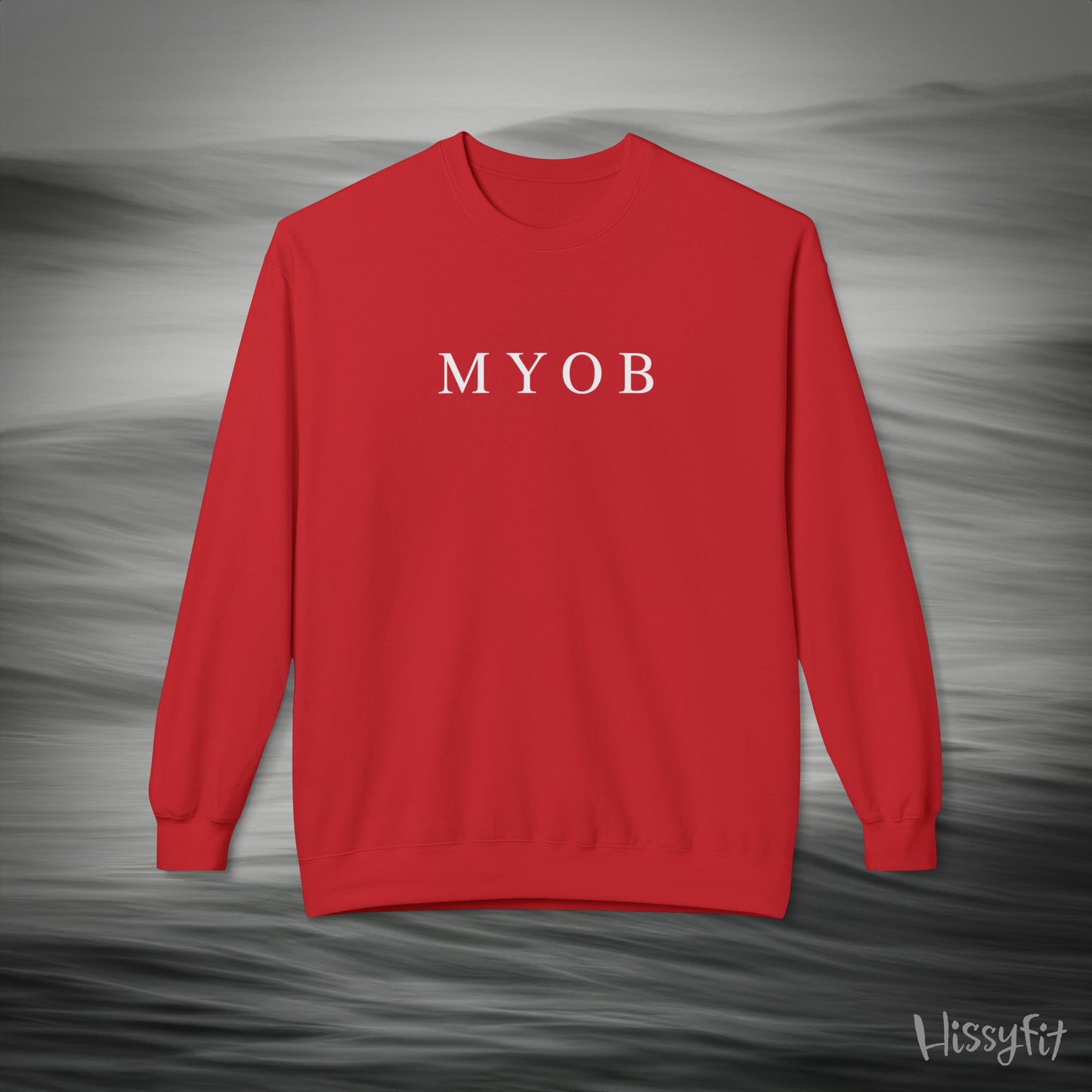 Red sweatshirt with 'MYOB' text on a gray background