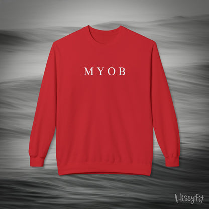 Red sweatshirt with 'MYOB' text on a gray background