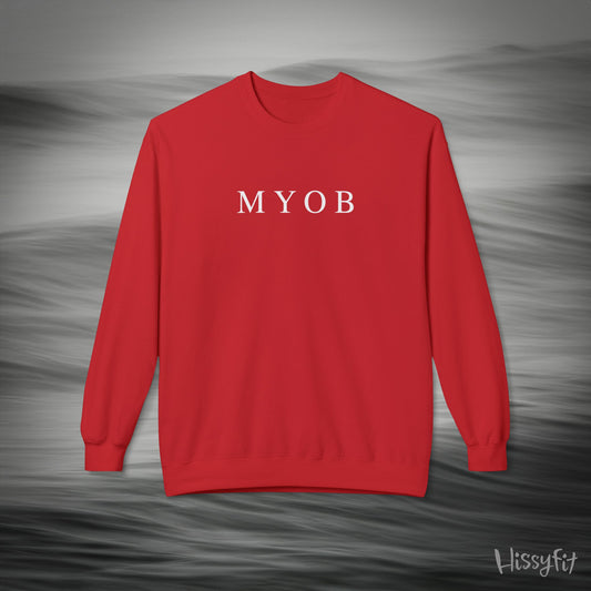 Red sweatshirt with 'MYOB' text on a gray background