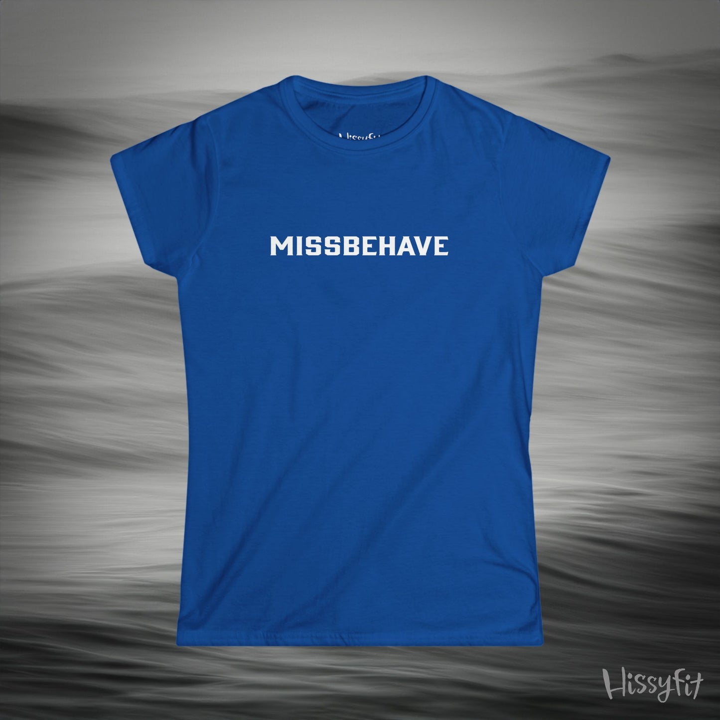 Blue t-shirt with 'MISSBEHAVE' text on a gray background