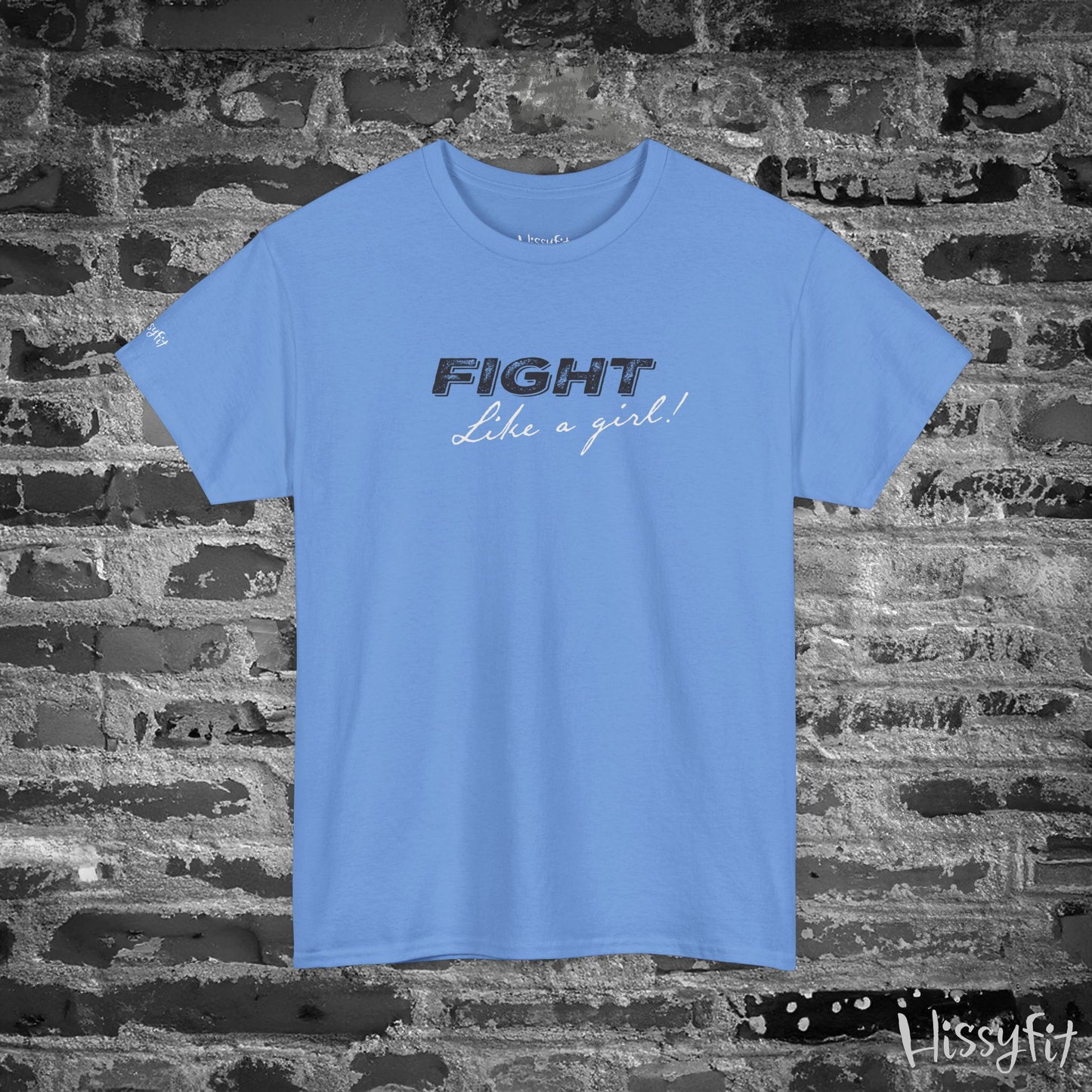 Blue t-shirt with 'Fight Like a Girl' text on a brick wall background
