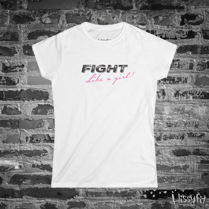 White t-shirt with 'Fight Like a Girl' text on a brick wall background
