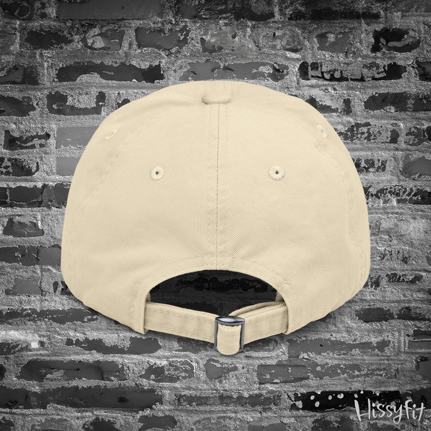 Beige cap on a textured gray background