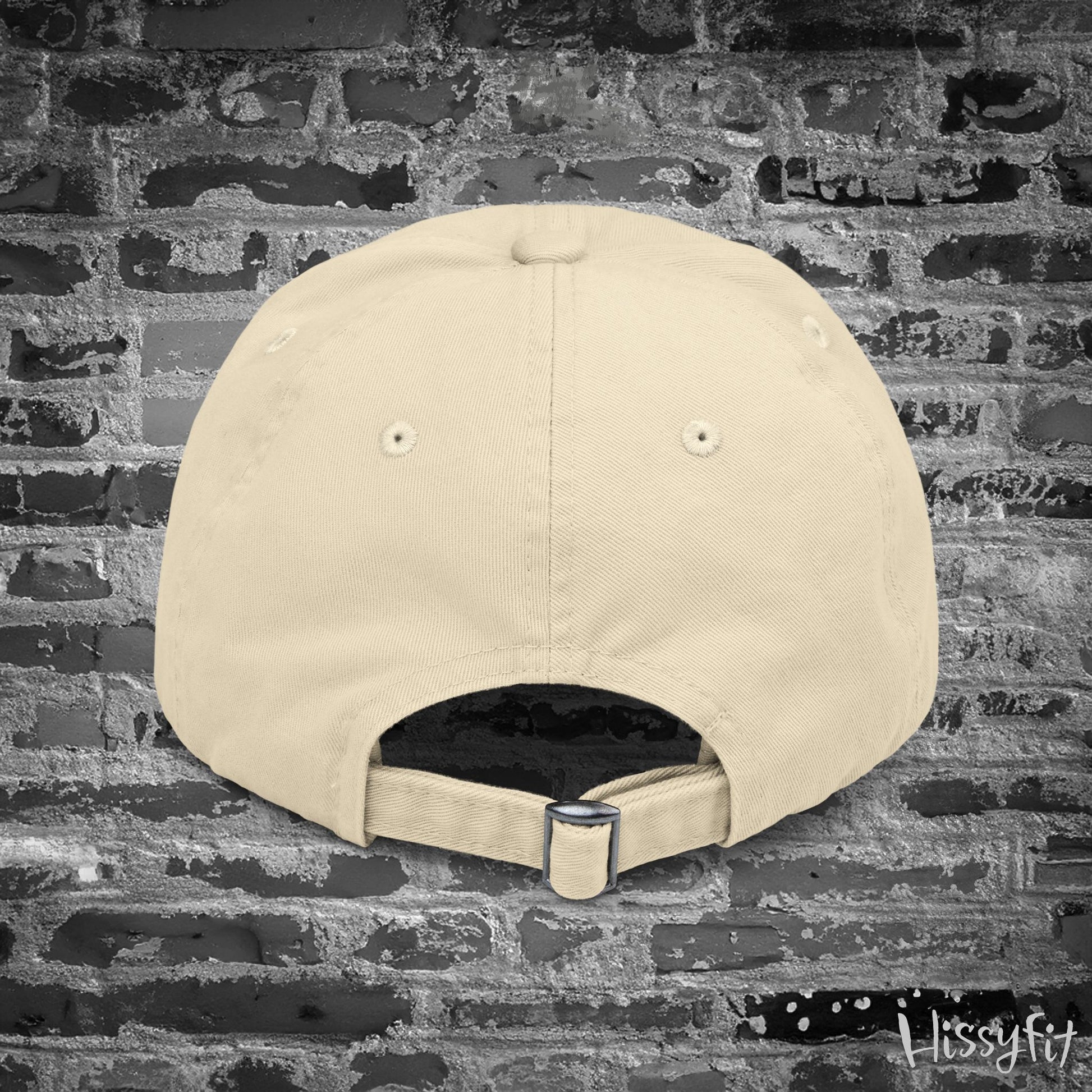 Beige cap on a textured gray background