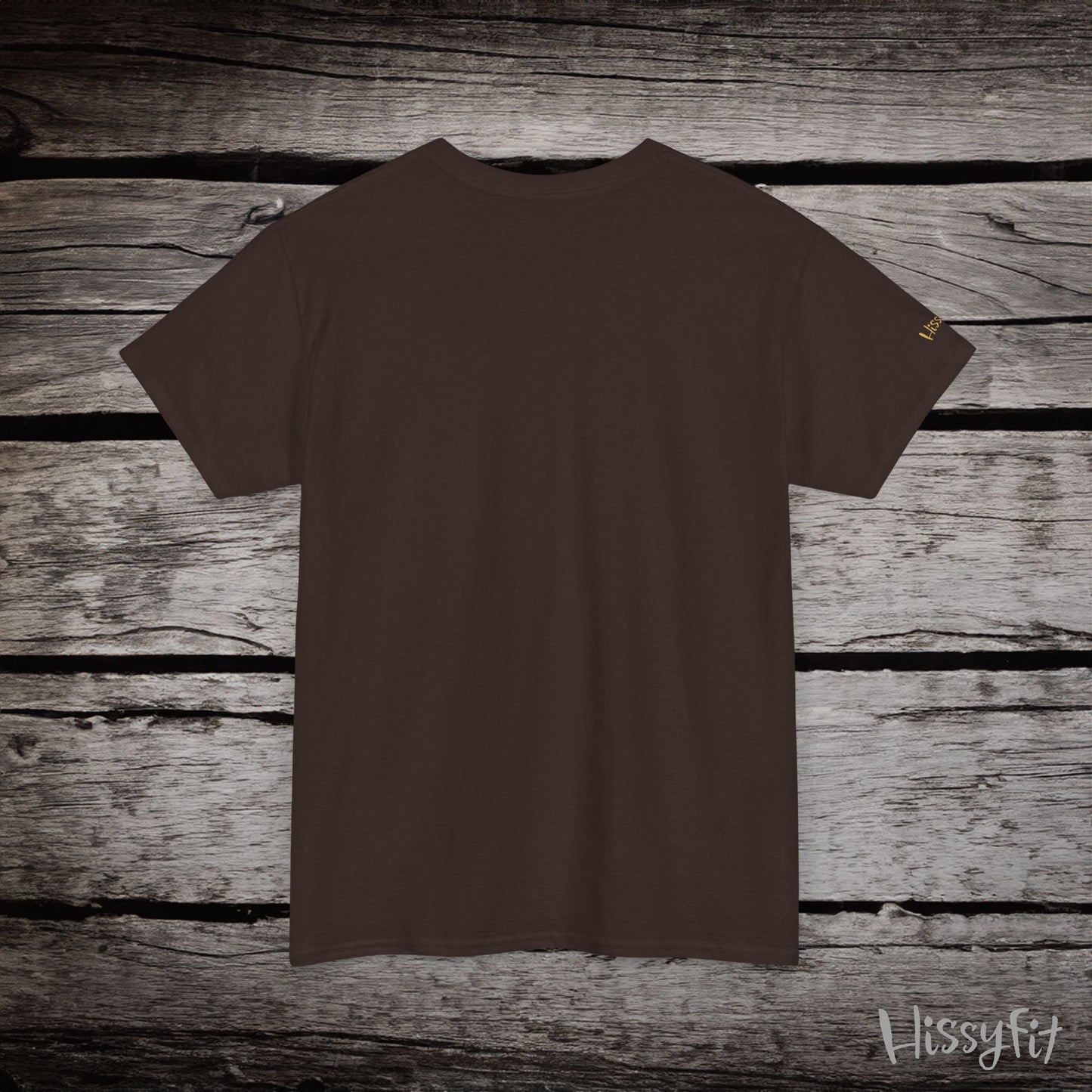 Brown t-shirt on a wooden surface with 'Hissyfit' branding.