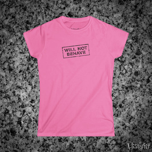 Pink t-shirt with 'WILL NOT BEHAVE' text on a gray surface, brand 'Hissyfit' visible.