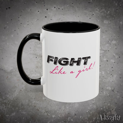 White mug with black interior and handle, featuring 'Fight Like a Girl' text on a gray background.