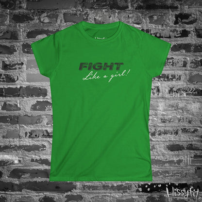 Green t-shirt with 'Fight Like a Girl!' text on a brick wall background