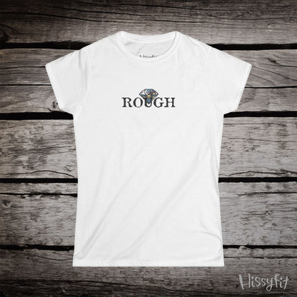 White t-shirt with a graphic diamond in 'Rough' text on a wooden surface, featuring the brand 'Hissyfit'.