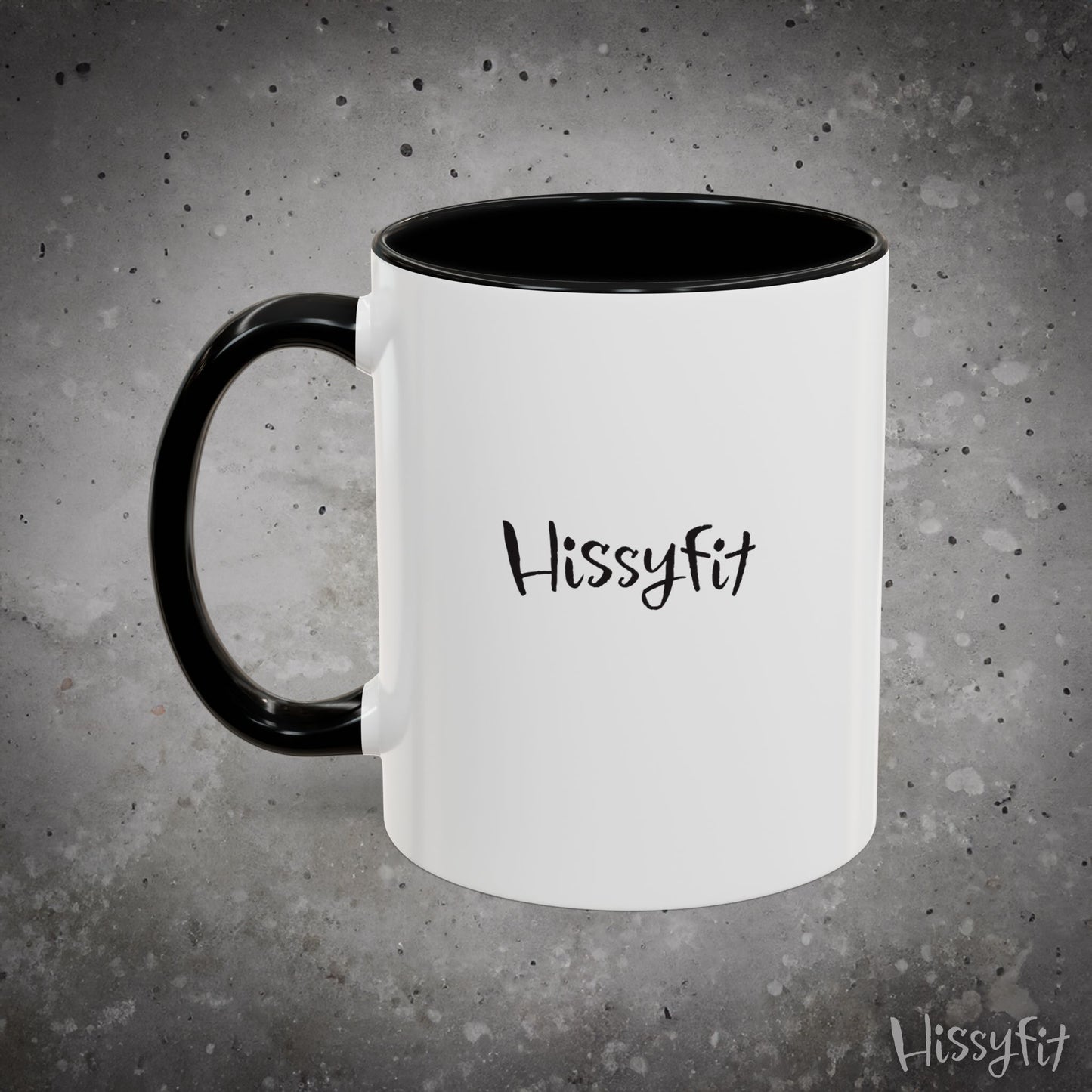 White mug with black handle and 'Hissyfit' text on a gray background