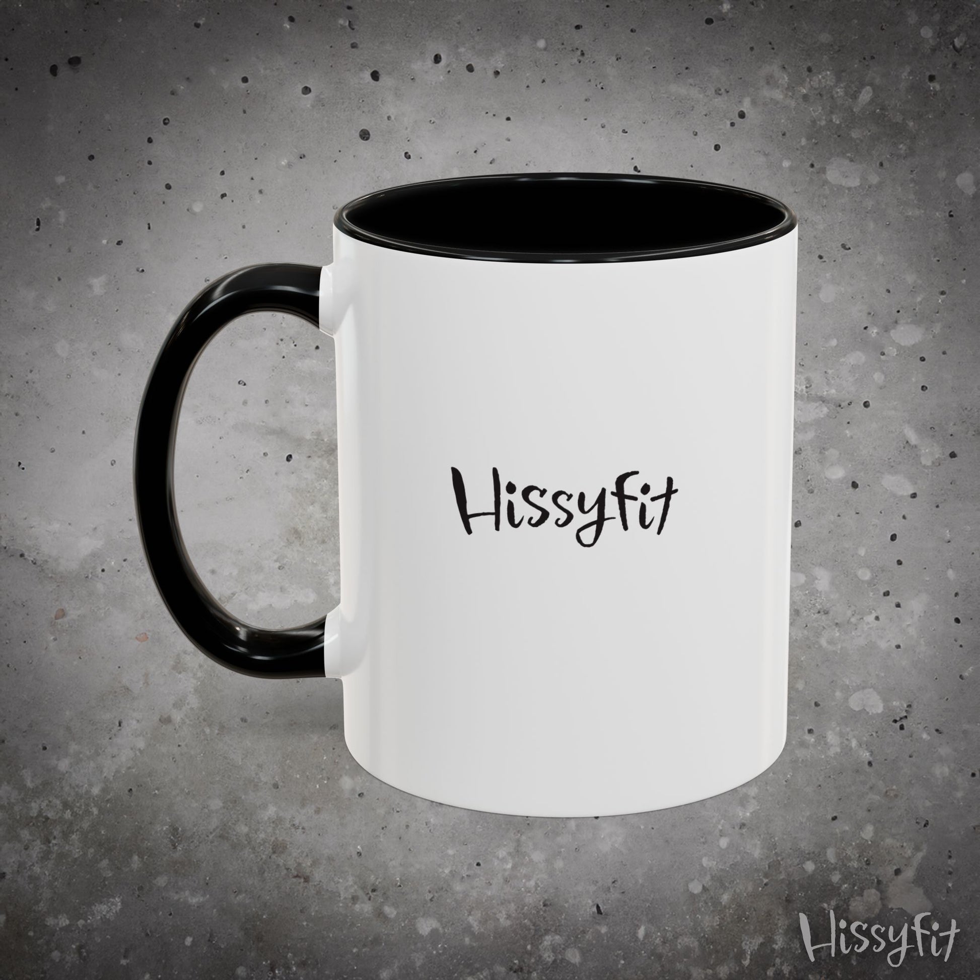 White mug with black handle and 'Hissyfit' text on a gray background