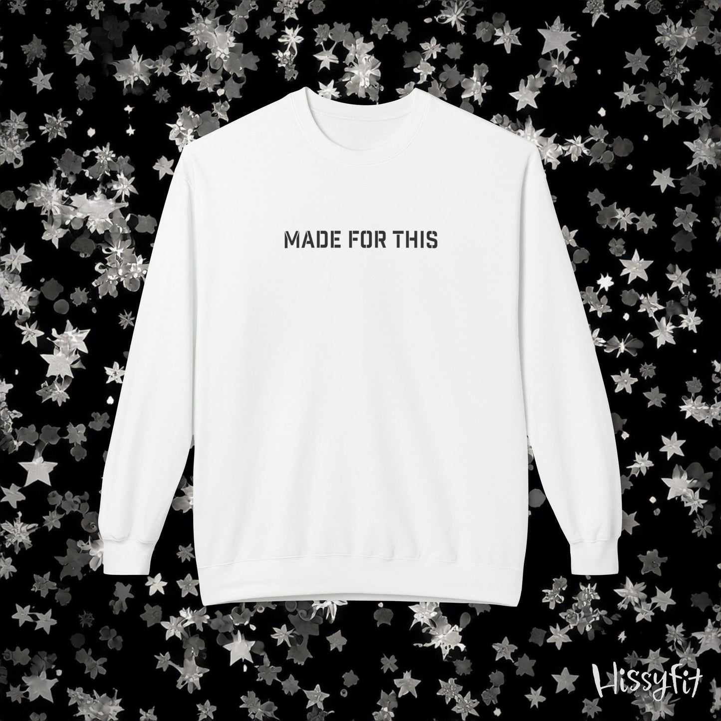 White sweatshirt with 'MADE FOR THIS' text on a black background with star patterns