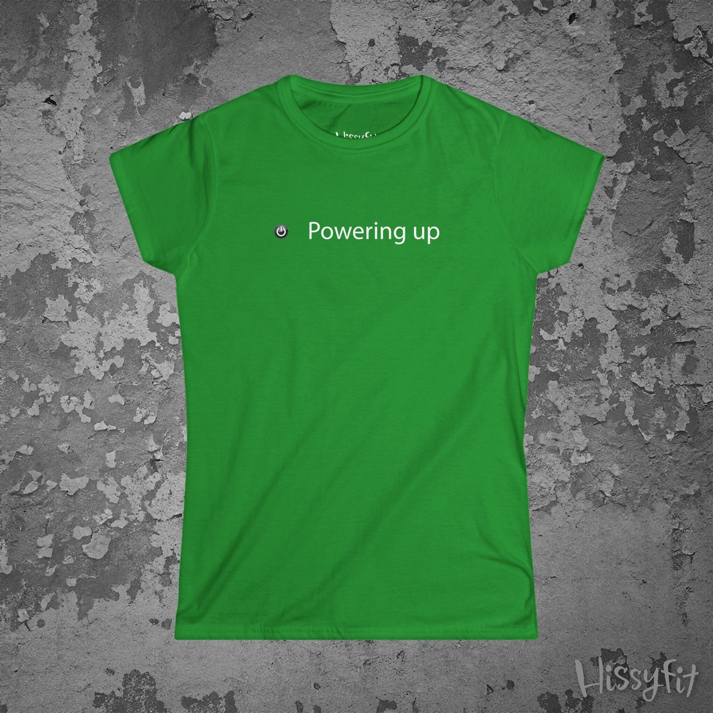 Green t-shirt with 'Powering up' text on a textured gray background