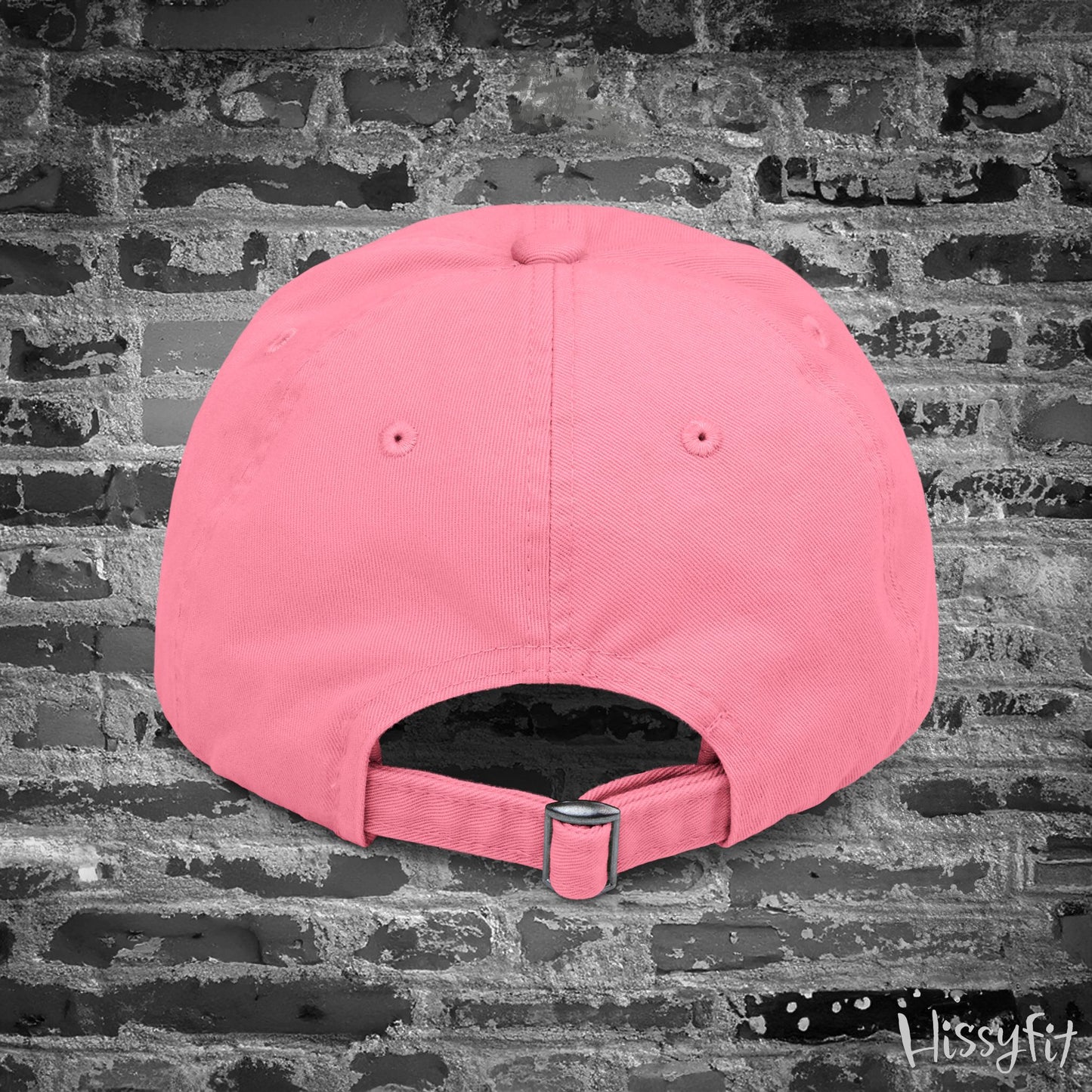 Pink cap on a textured gray background