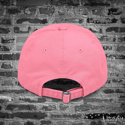 Pink cap on a textured gray background