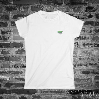 White t-shirt with a green battery symbol and '100%' charged on a brick wall background