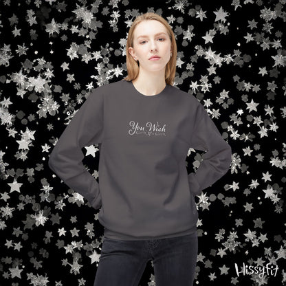 Person wearing a dark gray sweatshirt with 'You Wish' text against a star-patterned background