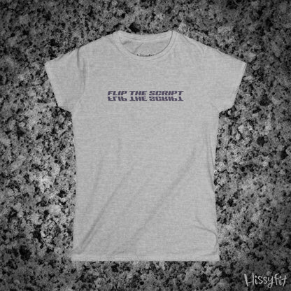 Gray t-shirt with 'FLIP THE SCRIPT' text on a granite surface, featuring the brand 'Hissyfit'.