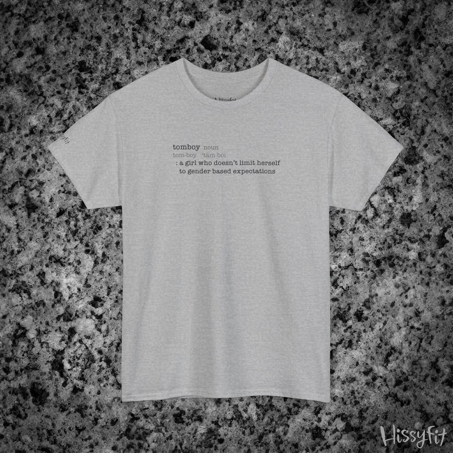 Gray t-shirt with text 'Tomboy:definition' on a gray and black speckled background, featuring the brand 'Hissyfit'.