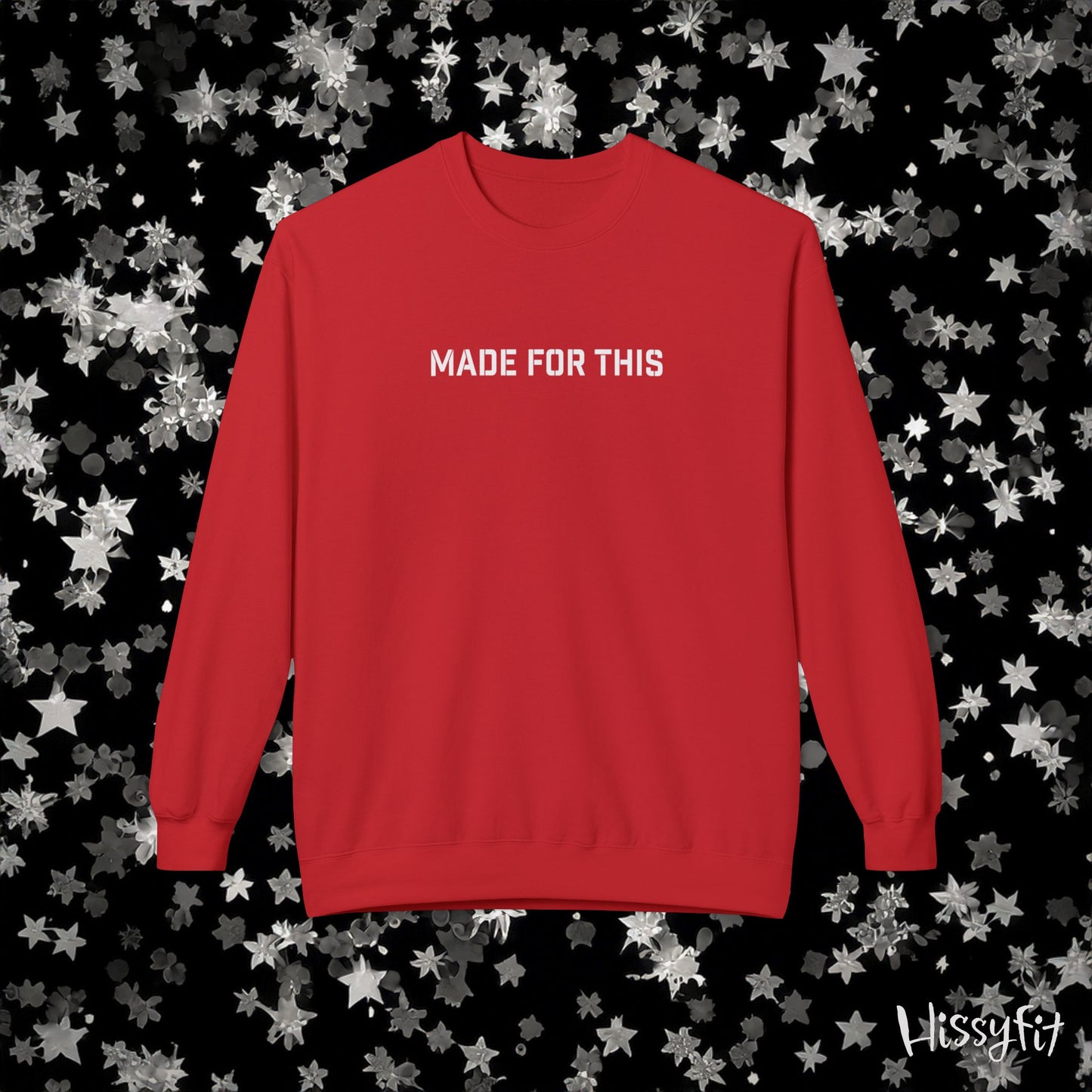 Red sweatshirt with 'MADE FOR THIS' text on a black background with star patterns