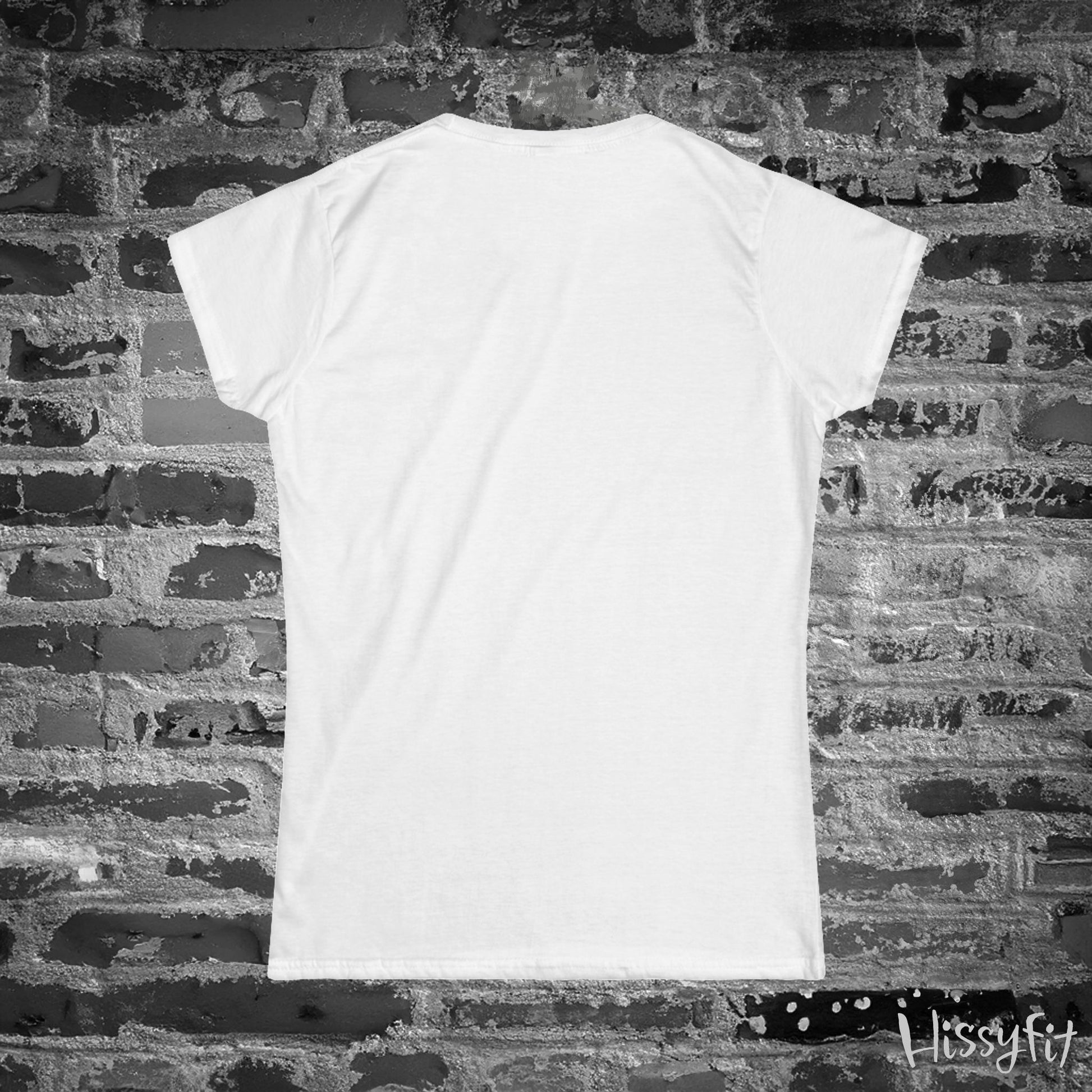 White t-shirt on a textured brick wall